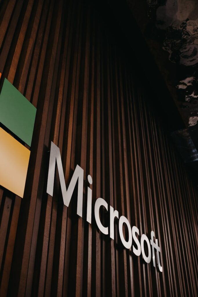 Interior view of Microsoft office with logo on wooden wall in Brussels, Belgium.